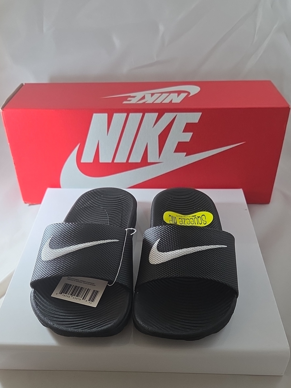 Nike Kids Black Slide Sandals with White Swoosh
